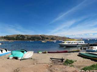  Visit of the Uros Islands and transfer to Copacabana 