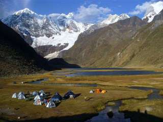 Flight to Lima and departure to Huaraz by bus.
